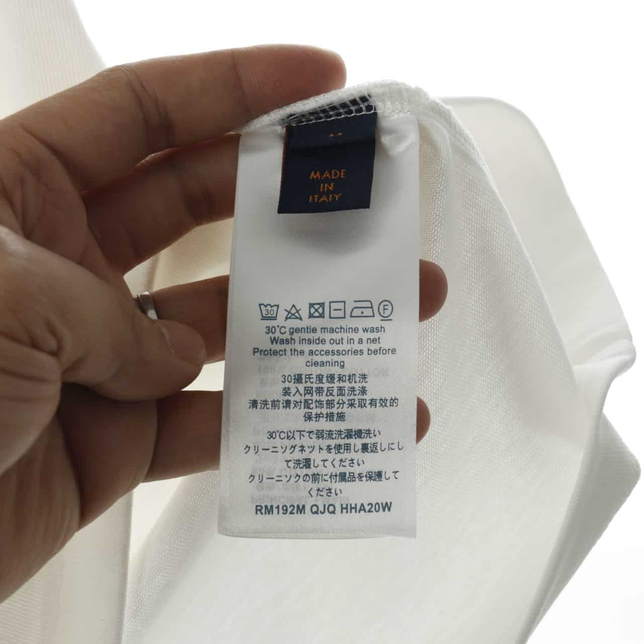 l0*is V*t0n red and blue logo badge