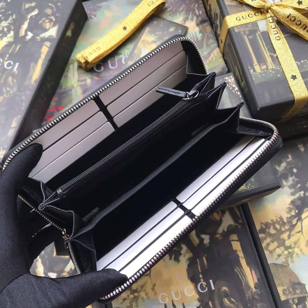 G*u*i leather zip around wallet with web