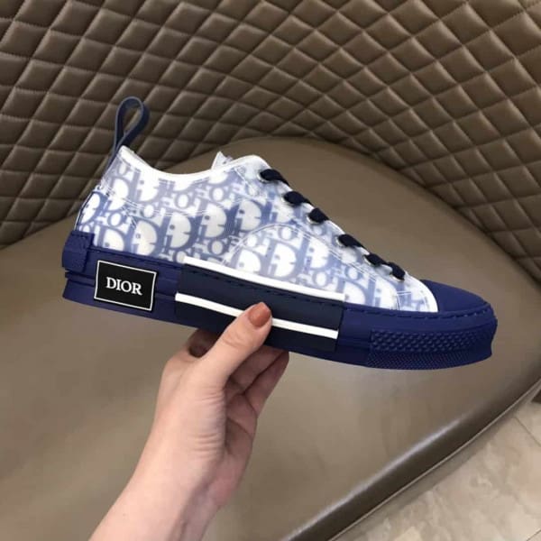 D*or b23 low-top sneaker in blue D*or oblique – cd84
