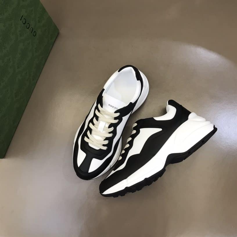 G*u*i rhyton low top sneakers in black and white – gc124