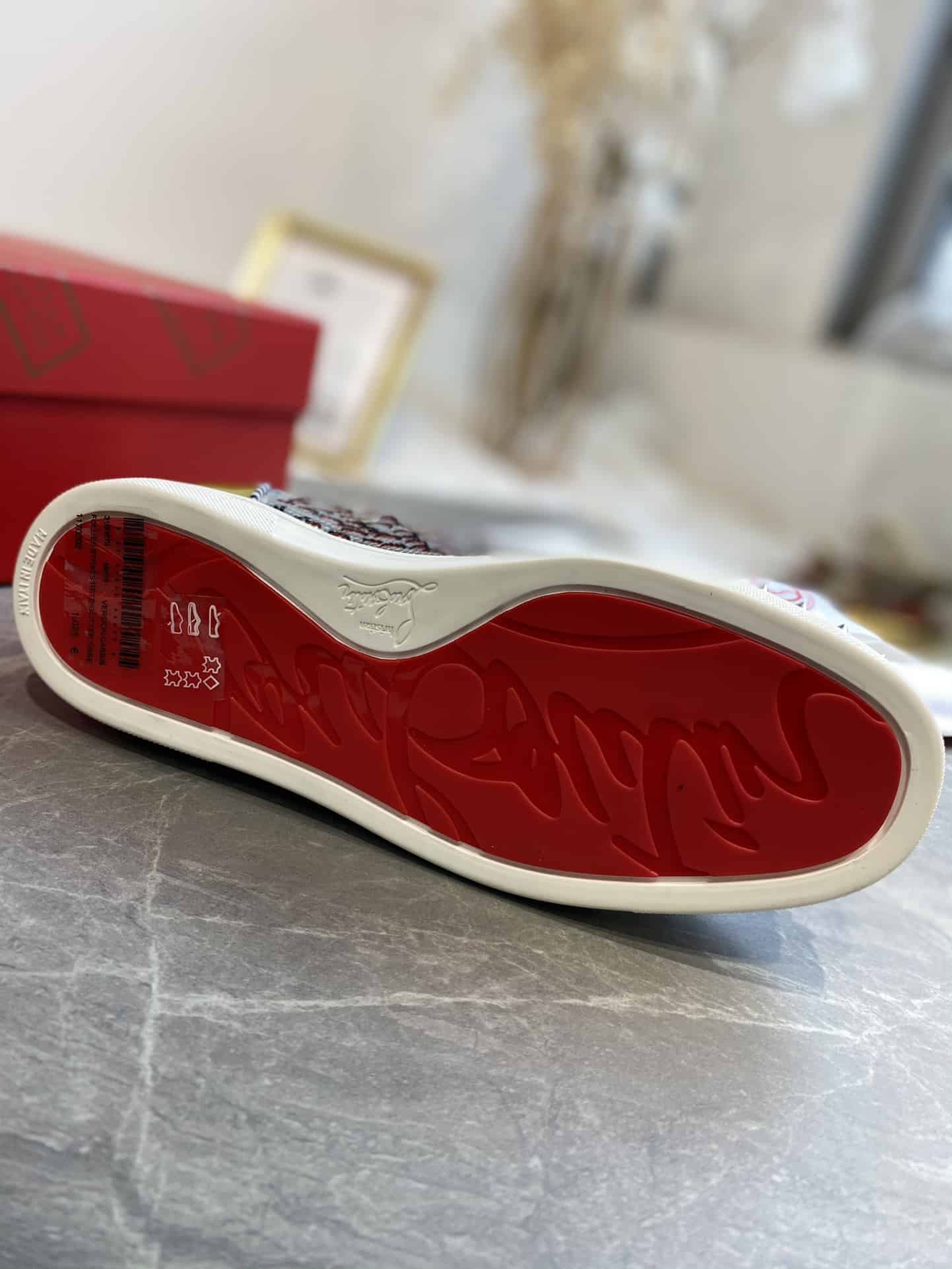 Ch**an louboutin high-top sneaker - cl182